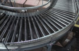 Неприводной рольганг для транспортировки коробок с молоком размером 300х400мм